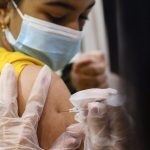 FILE PHOTO: Children age 5-11 receive vaccination against the coronavirus disease (COVID-19)