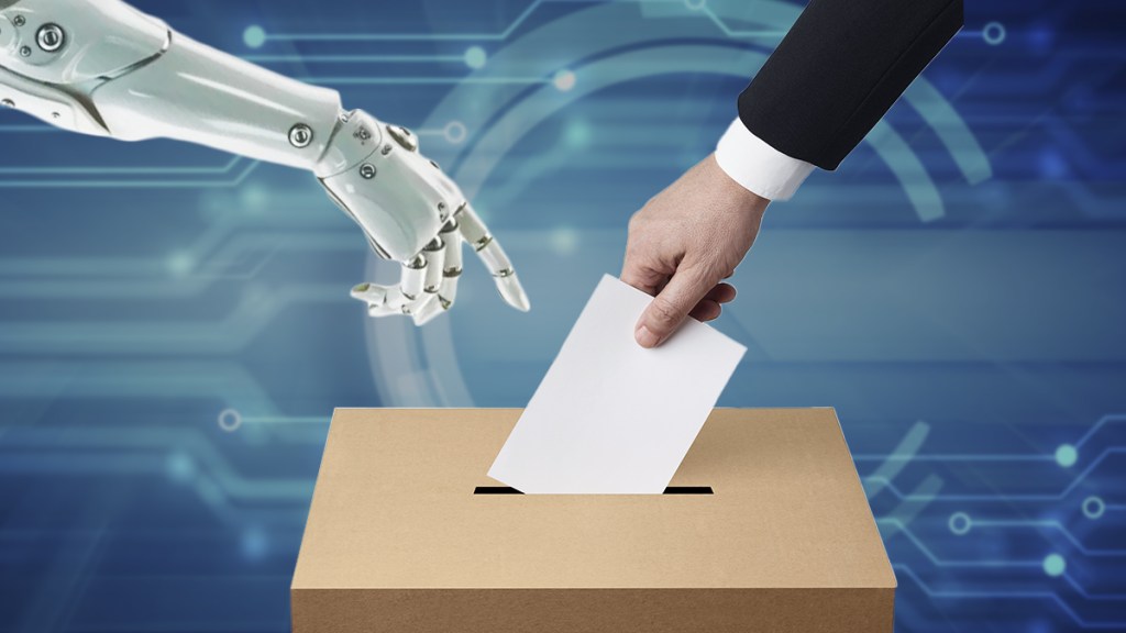A robotic hand reaching towards a ballot box while a human hand is inserting a voting slip.