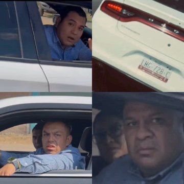 Hombre sentado en un automóvil mirando hacia afuera, con rostro serio.