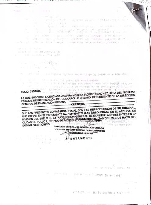 Certificado oficial del Sistema Estatal de Información del Desarrollo Urbano, firmado por la Jefa Yoiro Jacinto Sánchez, que confirma la reproducción de documentos relacionados con el archivo del expediente en Toluca.
