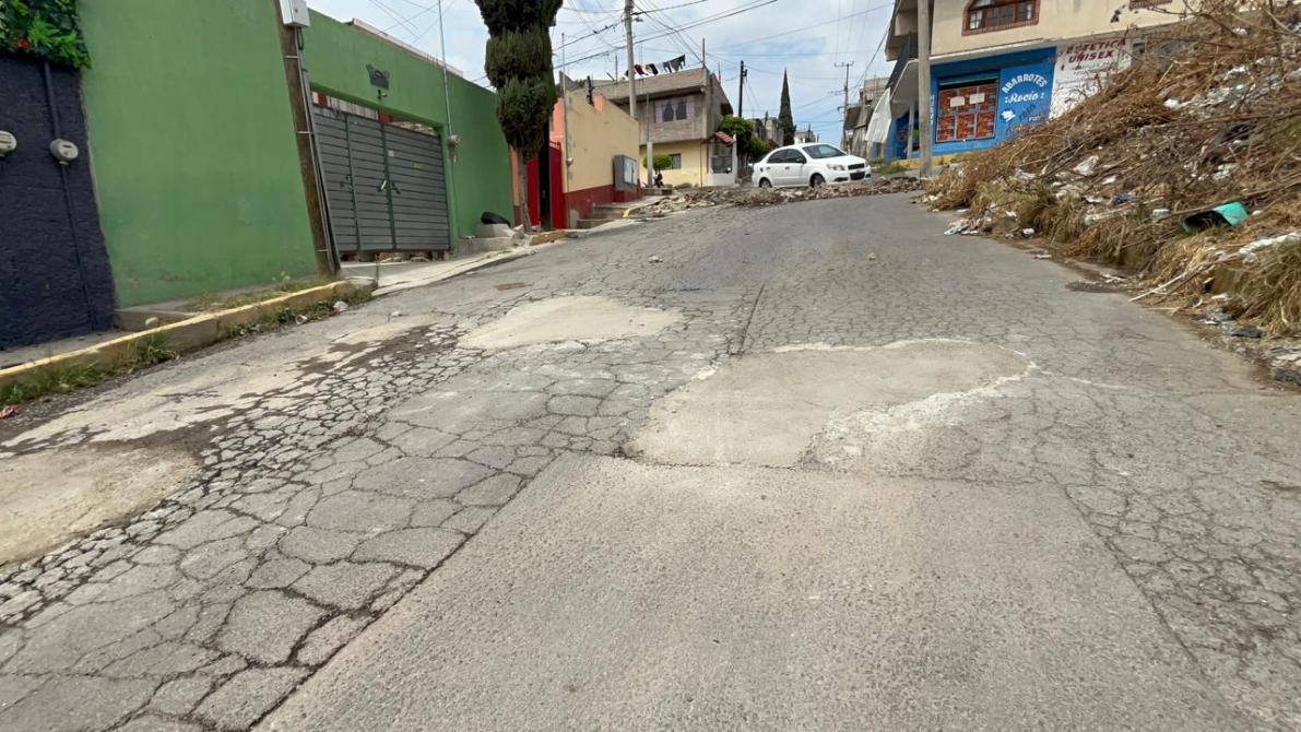 vecinos rehabilitan calle en ixtapaluca