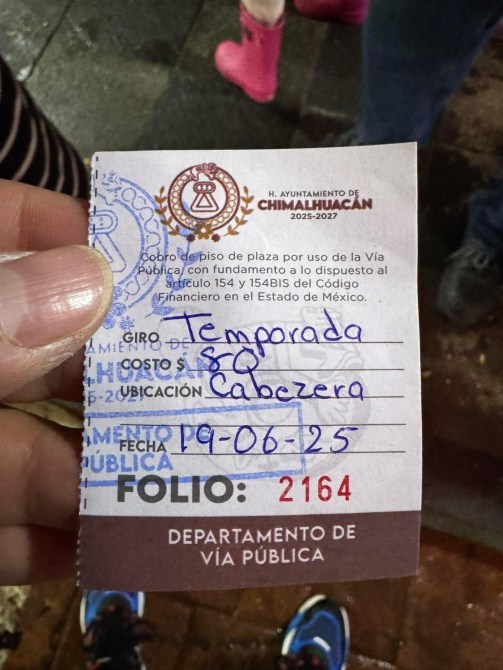 Recibo de cobro de uso de la vía pública del Ayuntamiento de Chimalhuacán, con detalles sobre el giro, costo y ubicación.